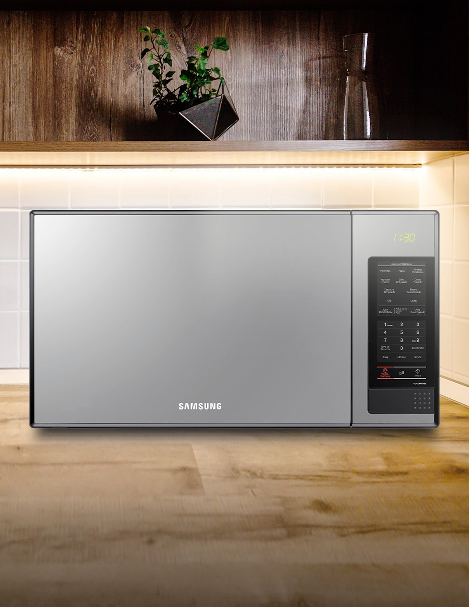 Horno de microondas con grill modelo MG402MCDXBB/AX de 1.4 pies cúbicos 5