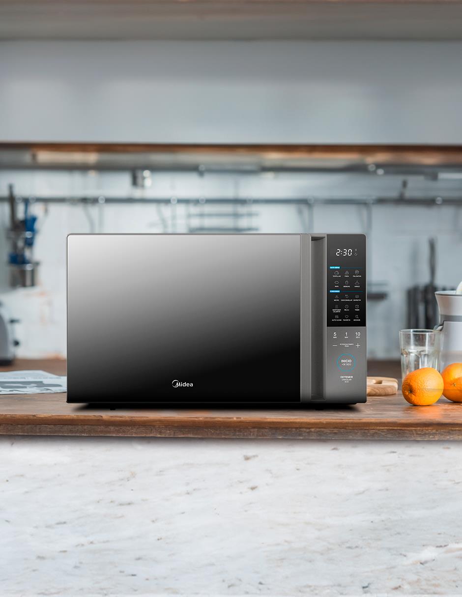 Horno de microondas convencional modelo MMDT14S2MG de 1.4 pies cúbicos 6